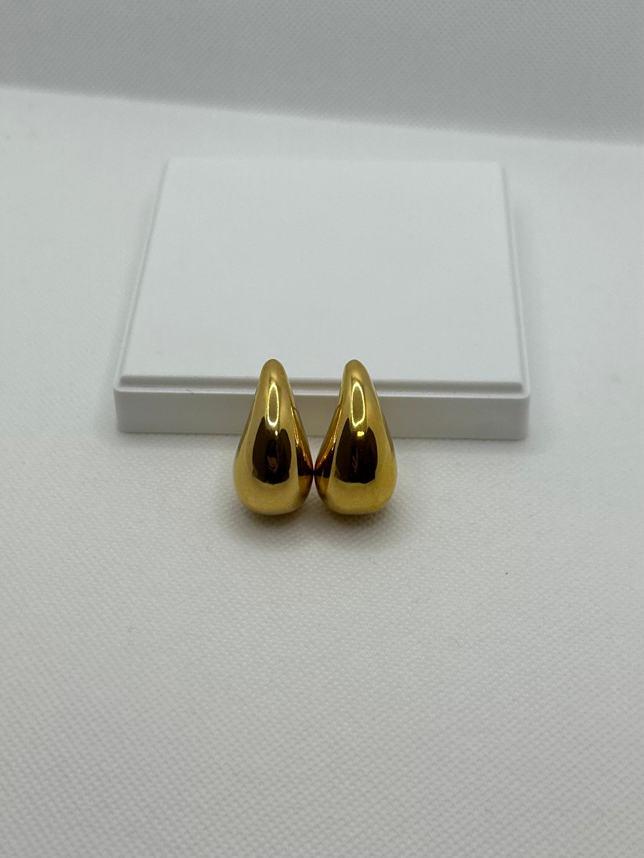 Boucle d'oreille BOT